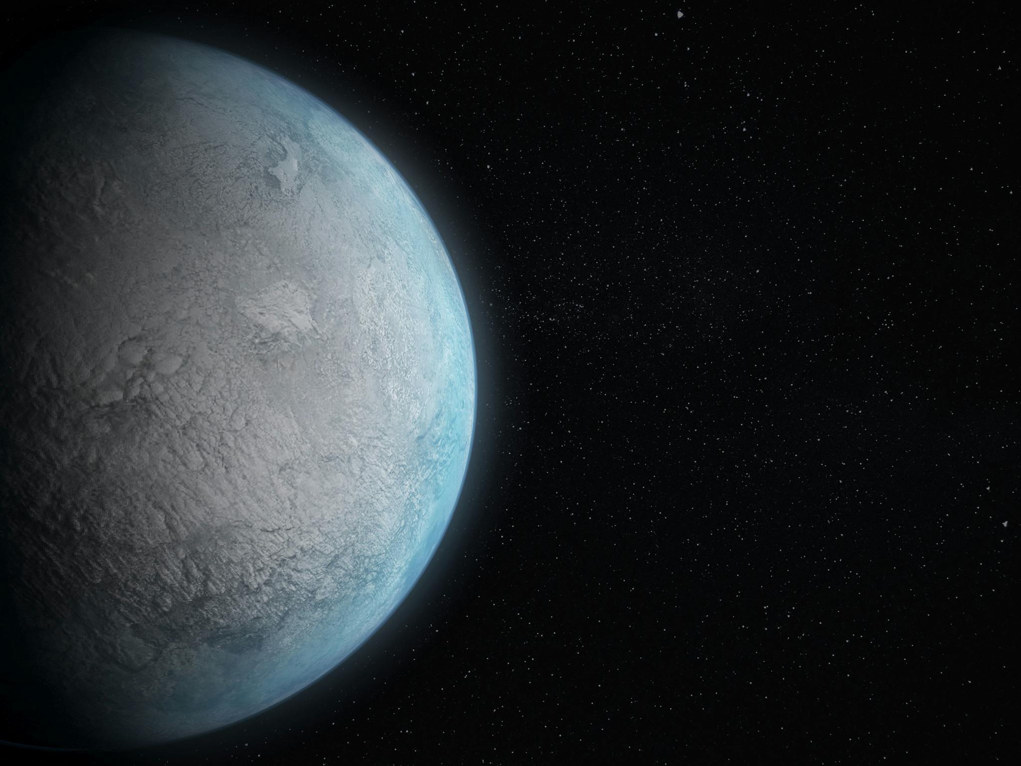 A frozen planet amidst a starry cosmos, showcasing space's beauty and mystery.