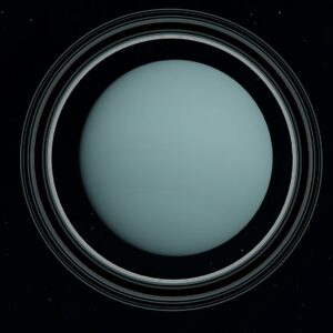 Captivating view of Uranus showcasing its distinct rings and celestial surroundings.