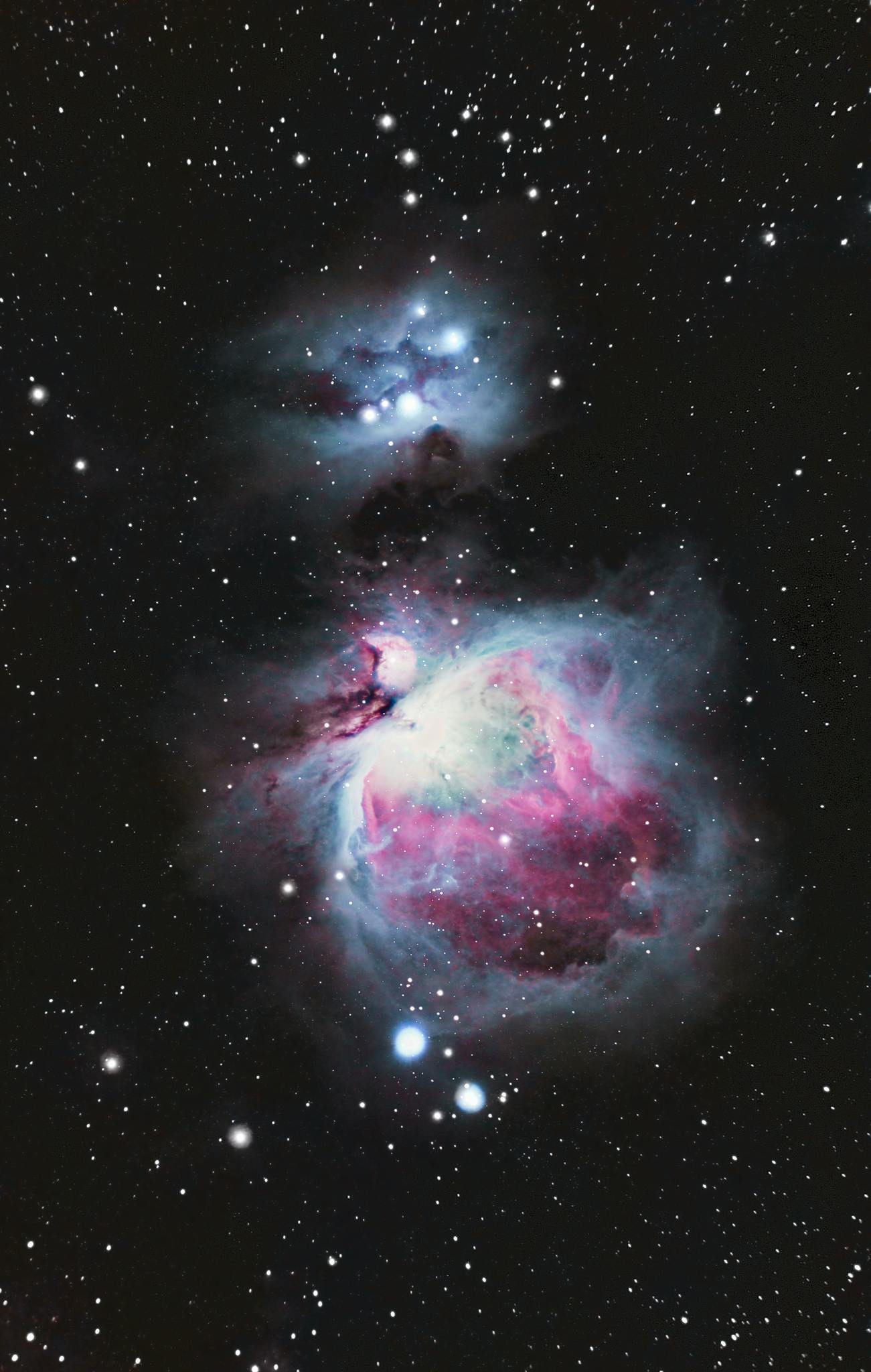 A breathtaking image of the Orion Nebula showcasing stars and cosmic dust in deep space.